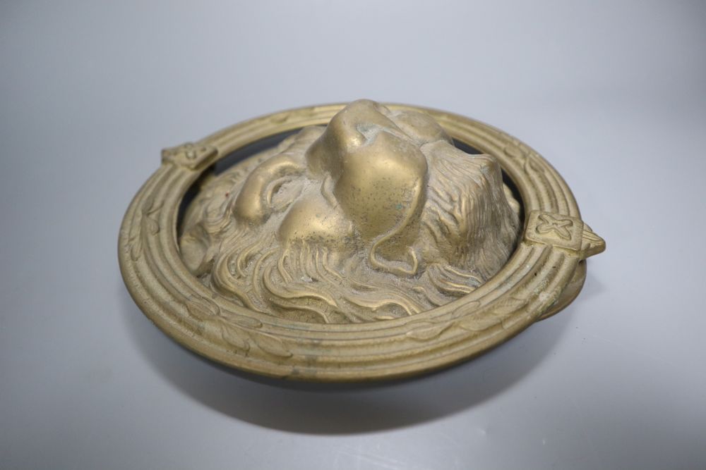 A large cast brass lions head door knocker, diameter 21cm